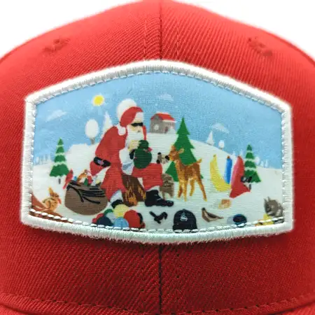 Photo of a detailed holiday scene sublimated onto a hexagon shaped patch